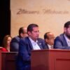 Conrado Paz Torres, diputado del PRD en el Congreso del Estado, hablando ante autoridades y comunidades mazahuas en ceremonia solemne en Zitácuaro, Michoacán