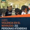 Personal de la Fiscalía General del Estado de Michoacán instalando módulo de atención sobre prevención violencia en el