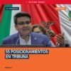Fotografía del diputado Antonio Carreño Sosa hablando en tribuna del Congreso del Estado en Morelia, con fondo de bandera