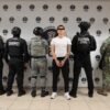 Fiscalía de michoacán detención: imagen simbólica de sello oficial de la FGE sobre fondo azul con silueta de policía y mapa