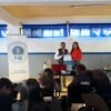 Grupo de estudiantes en aula universitaria en Morelia durante charla sobre prevención del acoso escolar impartida por la FGE